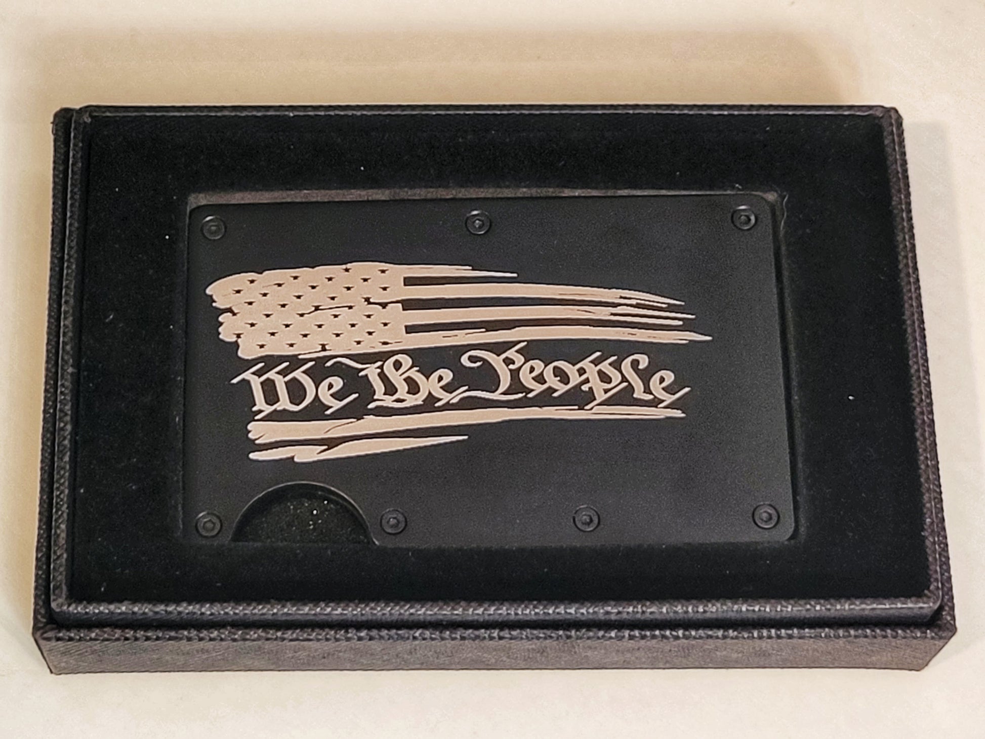 We The People with tattered flag, black slim wallet, in a gift box