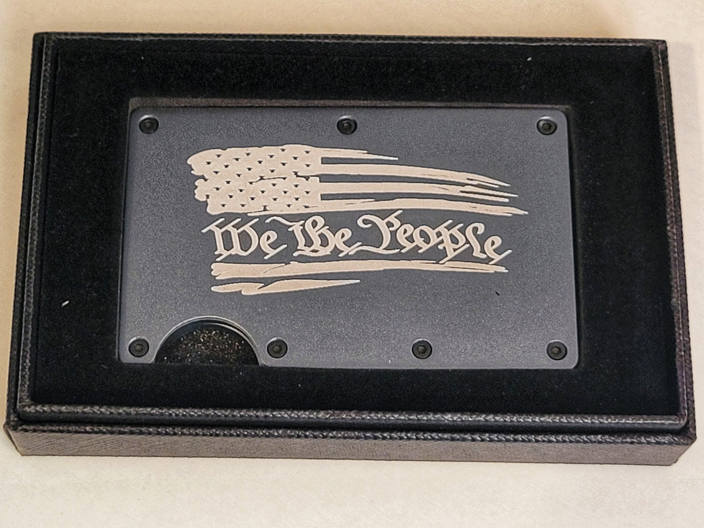 We The People with tattered flag, gray slim wallet, in a gift box